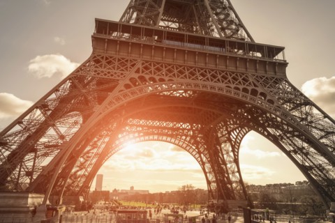 Tourists under Eiffel Tower