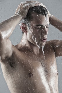 Caucasian man showering