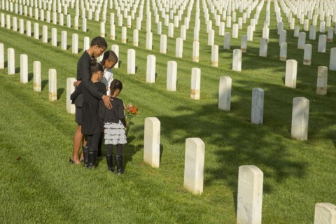 Black family at military cemetery