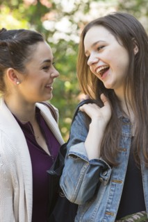 Close up of Caucasian women laughing