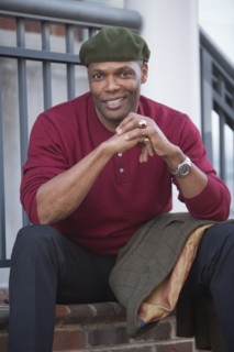 Portrait of African American man sitting on stoop