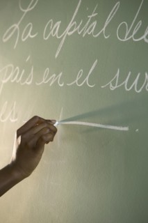 Hand writing on chalkboard