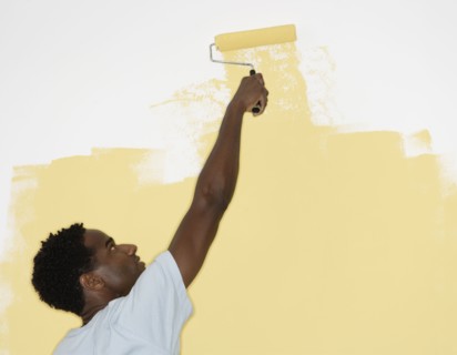 Man painting wall