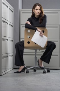 Portrait of businesswoman sitting in chair