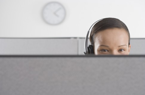 Upper section of woman's head in office