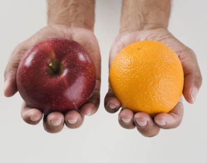 Close up of hands holding two apples