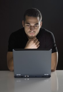 Man in front of laptop