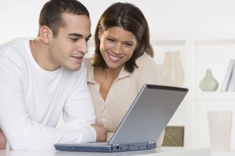 Couple looking at computer screen