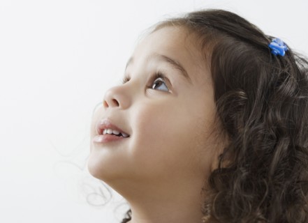 Little girl looking up
