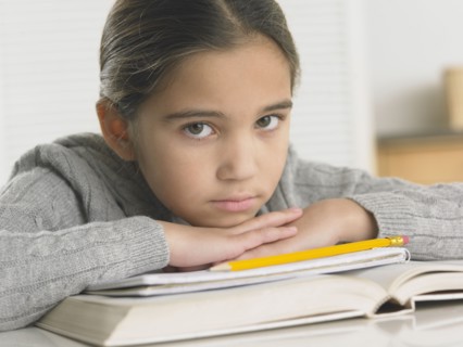 Young girl doing her homework