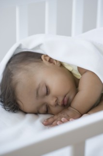 Close up of Hispanic baby sleeping