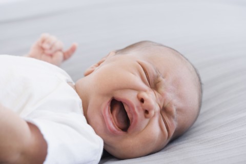 Close up of crying newborn baby