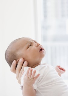 Mother holding newborn baby