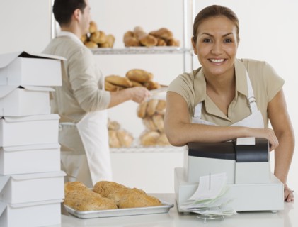 Portrait of Hispanic female bakery worker