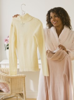 African woman deciding what to wear