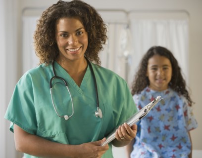 African female doctor holding chart