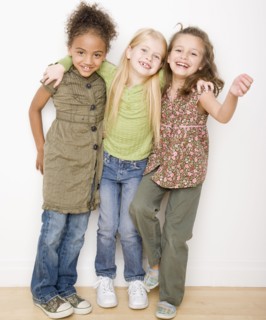 Multi-ethnic girls hugging