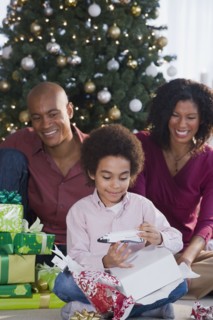 African family opening Christmas gifts