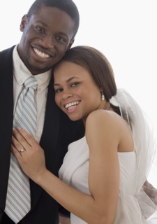 African newlyweds hugging