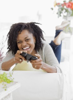 African woman playing video games