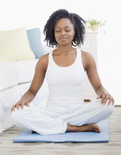 African woman meditating