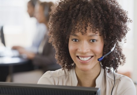 African woman wearing headset
