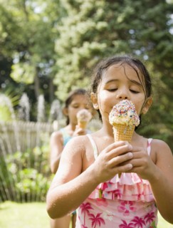 Hispanic girls eating ice cream cones