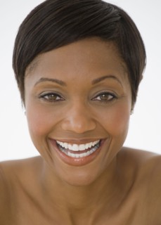 Confident African woman smiling