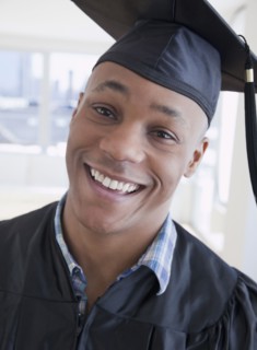 African man in graduation cap and gown