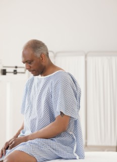 African man waiting for doctor in hospital