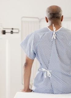 African man in hospital gown