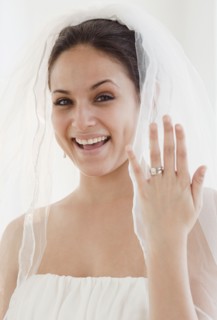 Bride showing off wedding ring