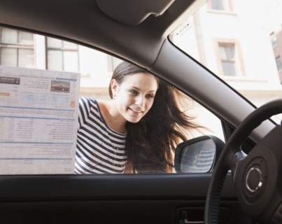 Mixed race woman shopping for new car