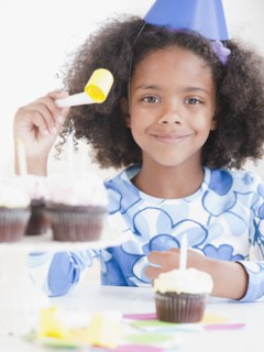Mixed race girl at birthday party