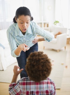 Mixed race mother lecturing son