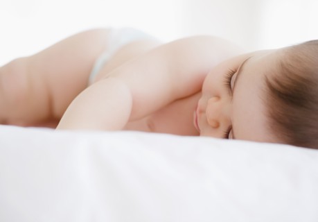 Mixed race baby boy sleeping