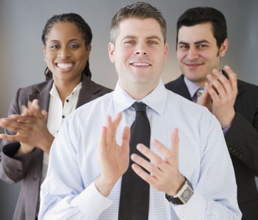 Business people clapping