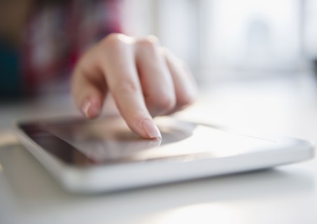 Korean woman using digital tablet