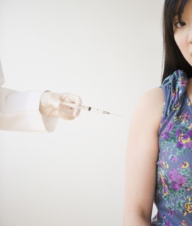 Korean woman receiving injection