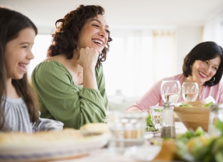 Family eating dinner together