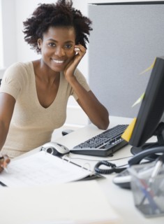 Black businesswoman working at desk