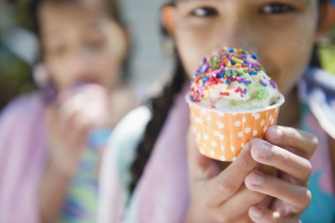 Hispanic girls eating ice cream