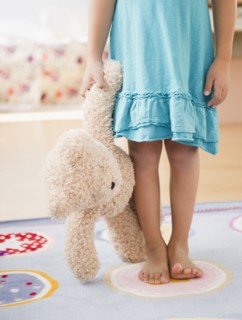 Korean girl holding teddy bear