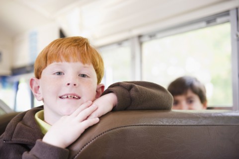 Children riding school bus