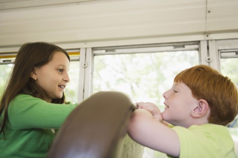Children riding school bus