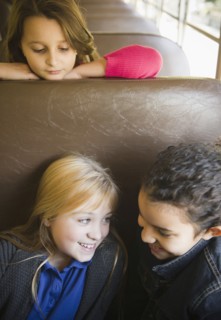 Children riding on school bus