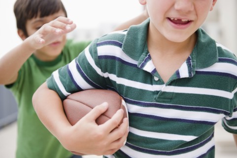 Boys playing football