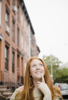 Caucasian woman thinking outdoors