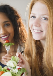 Friends eating salad together