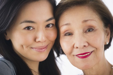 Smiling Japanese mother and daughter